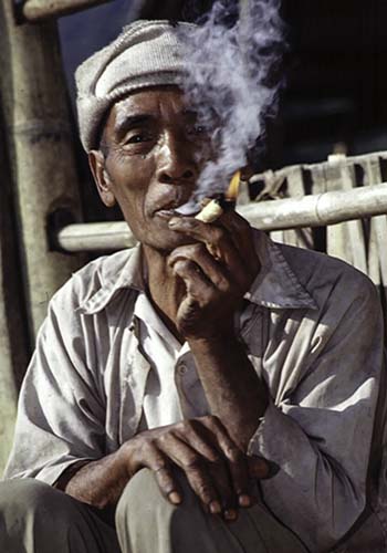Man Smoking Cheroot, China